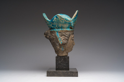 A large Chinese partly turquoise-glazed pottery head of Guanyin in Ming style, probably 19th C.