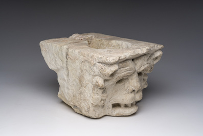 An architectural limestone fragment with a lion's head, probably 16th C.