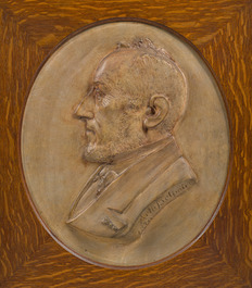 Belgian school: A pair of terracotta patinated plaster portrait reliefs of Arthur Belpaire and his wife, dated 1870