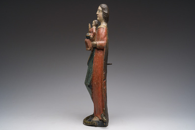 A Flemish polychromed wooden sculpture of The Madonna with Child, 18th C.