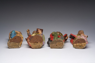 Four polychrome decorated wooden 'evangelist' sculptures, 19th C.