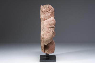 An Indian yellow-speckled red sandstone relief of a devata, probably Mathura school, Kushan period 2nd C. b.C./2nd C.