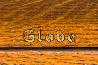 Two wooden filing cabinets, Globe Wernicke and Au Ch&ecirc;ne Vert, and a four compartment storage box, 19th/20th C.