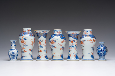 A Chinese Imari style five-piece miniature garniture and two blue and white vases with floral design, Kangxi