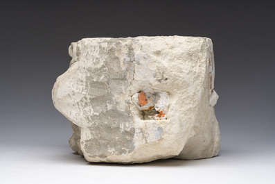 An architectural limestone fragment with a lion's head, probably 16th C.