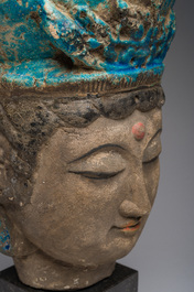 A large Chinese partly turquoise-glazed pottery head of Guanyin in Ming style, probably 19th C.
