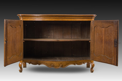 A Li&egrave;ge oak Louis XV buffet, 18th C.