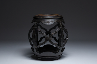 A reticulated Chinese wooden stand with marble top and a French gilt brass and champlev&eacute; 'elephant' lamp, 20th C.