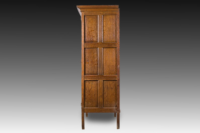 A Flemish oak two door cupboard with cast iron hinges, 17th C.