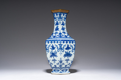 A Chinese blue and white hexagonal 'sanduo' vase, Qianlong mark and of the period
