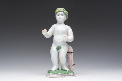 A polychrome Brussels faience allegorical sculpture depicting one of the four seasons, 19th C.
