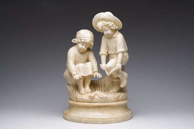 Italian school, attributed to Adolfo Cipriani (1857-1941): Two children warming themselves by the fire, alabaster, 20th C.