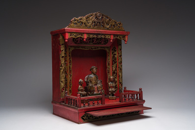 A Chinese gilt-lacquered wooden home altar with figures, 19th C.