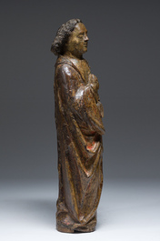 A large Flemish polychromed wooden 'Saint John' sculpture, 17th C.