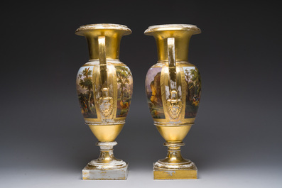 A pair of fine gilt and polychrome Paris porcelain 'animated landscapes' Empire vases, first half 19th C.