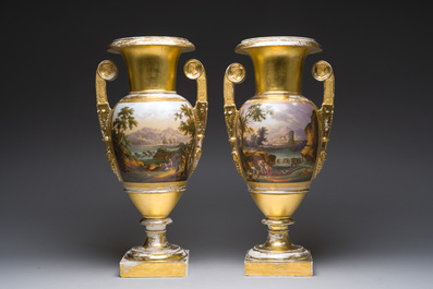 A pair of fine gilt and polychrome Paris porcelain 'animated landscapes' Empire vases, first half 19th C.