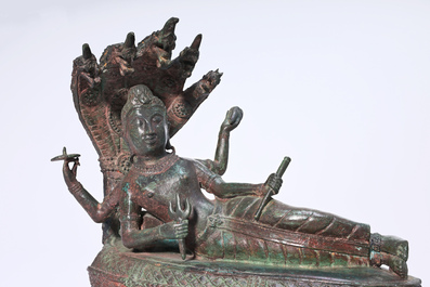 Indian school: Vishnu resting on Shesha or Ananta Shesha, king of the nagas, patinated bronze, 19th C.
