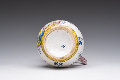 A polychrome French faience puzzle jug with Saint Peter, dated 1762, France, 19th C.