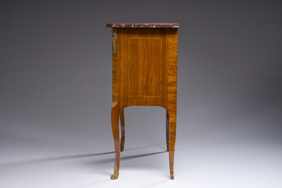 Jacques-Pierre Letellier (ca.1745-?): A mahogany veneer Louis XVI chest of drawers with gilt bronze mounts and red marble top