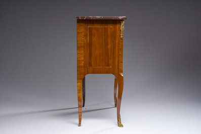 Jacques-Pierre Letellier (ca.1745-?): A mahogany veneer Louis XVI chest of drawers with gilt bronze mounts and red marble top