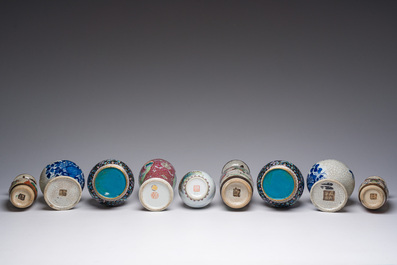 An extensive collection of Chinese blue, white, famille rose and verte porcelain and a pair of cloisonn&eacute; 'butterflies' vases, 20th C.