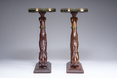 A pair of Italian faux marble-topped carved wooden whippet side table, early 20th C.