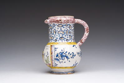 A polychrome French faience puzzle jug with Saint Peter, dated 1762, France, 19th C.