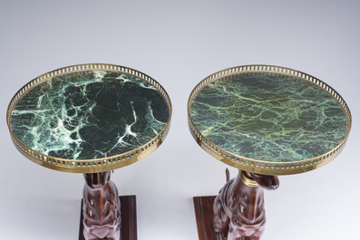 A pair of Italian faux marble-topped carved wooden whippet side table, early 20th C.