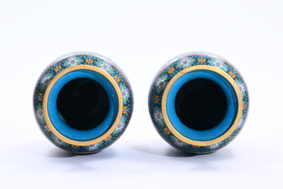 Two pairs of Chinese cloisonn&eacute; vases with cranes among blossoming branches, 20th C.