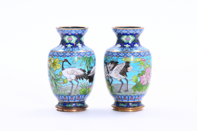 Two pairs of Chinese cloisonn&eacute; vases with cranes among blossoming branches, 20th C.