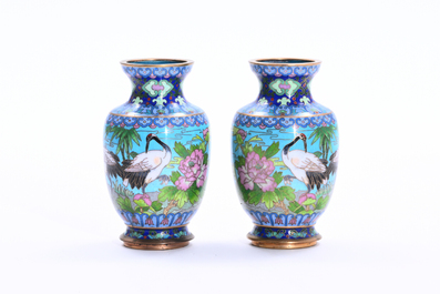 Two pairs of Chinese cloisonn&eacute; vases with cranes among blossoming branches, 20th C.