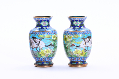 Two pairs of Chinese cloisonn&eacute; vases with cranes among blossoming branches, 20th C.