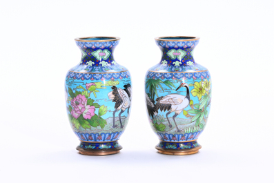 Two pairs of Chinese cloisonn&eacute; vases with cranes among blossoming branches, 20th C.