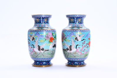 Two pairs of Chinese cloisonn&eacute; vases with cranes among blossoming branches, 20th C.