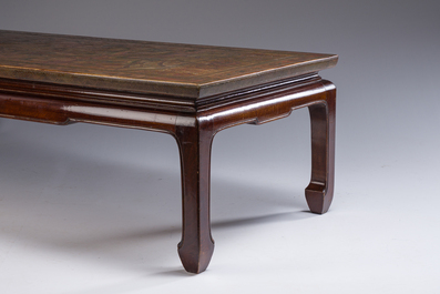 A Chinese low table with partly polychromed wooden top with engraved dragon and phoenix design, Qing and 20th C.