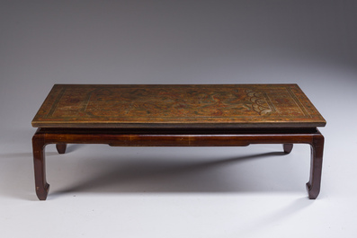A Chinese low table with partly polychromed wooden top with engraved dragon and phoenix design, Qing and 20th C.