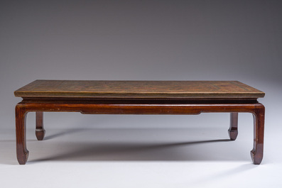 A Chinese low table with partly polychromed wooden top with engraved dragon and phoenix design, Qing and 20th C.