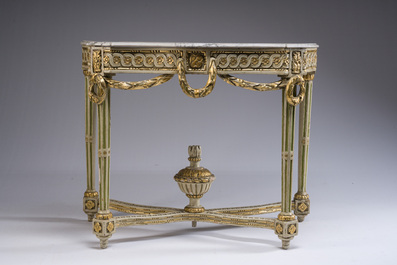 A parcel-gilt and polychromed wooden marble-topped console table in Louis XVI style, 19th C.