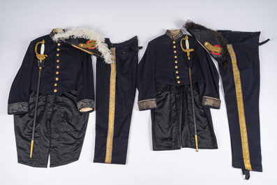 Two Belgian ceremonial costumes with bicorn hats and sables, 19th/20th C.