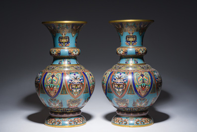 A pair of Chinese cloisonn&eacute; 'taotie masks' vases, 20th C.