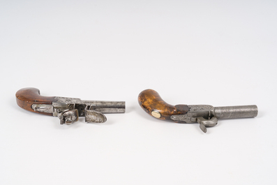 A French flint pocket pistol and a Liege percussion pocket pistol, both with engraved case lock, 19th C.