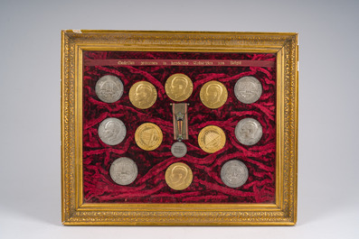 Two framed collections of medals and awards won in Belgian sports and baking competitions, 20th C.