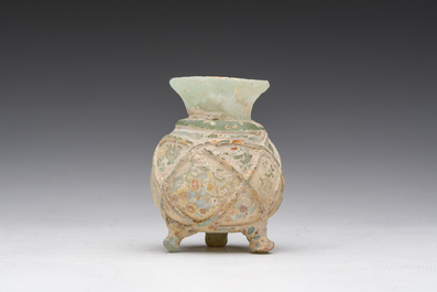 A Roman peel green glass tripod amphoriskos, Eastern Roman Empire, 5th C.