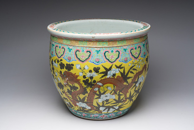 A Chinese famille rose Dayazhai style fish bowl with dragons among blossoming branches, 19th C.