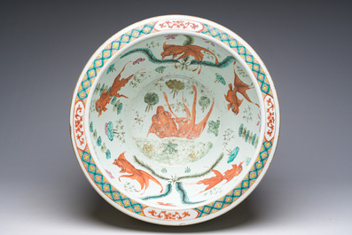 A Chinese famille rose Dayazhai style fish bowl with dragons among blossoming branches, 19th C.