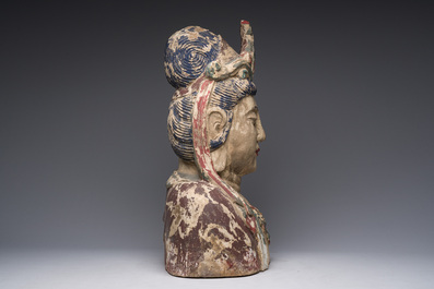 A large Chinese polychromed wooden bust of Buddha, 20th C.