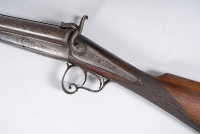 A French double-barreled pinfire hunting rifle with damask barrels and engraved breechblocks, marked, second half 19th C.