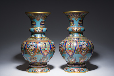 A pair of Chinese cloisonn&eacute; 'taotie masks' vases, 20th C.