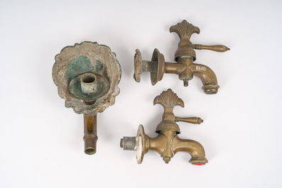 A grotesque bronze fountain mouth and two taps, probably Italy, 17th C.