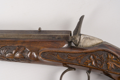 A Li&egrave;ge Flobert salon pistol with sculpted floral design, 19th C.